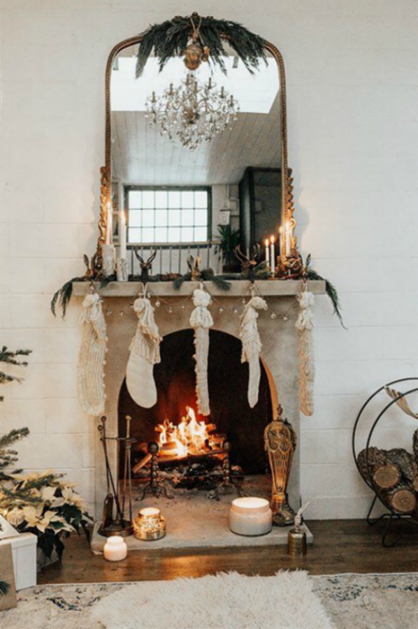 Beautiful and romantic holiday decorated fireplace - Anthropologie. #holidaydecor #fireplace #christmasdecor