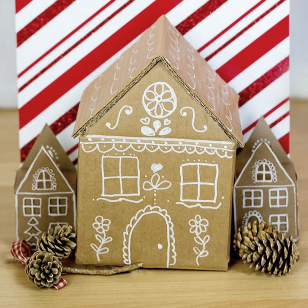 Cardboard diy gingerbread gift box is a simple project requiring a box, glue, and a white chalk pen! #cardboardboxcraft #christmasdiy #gingerbreadhouse