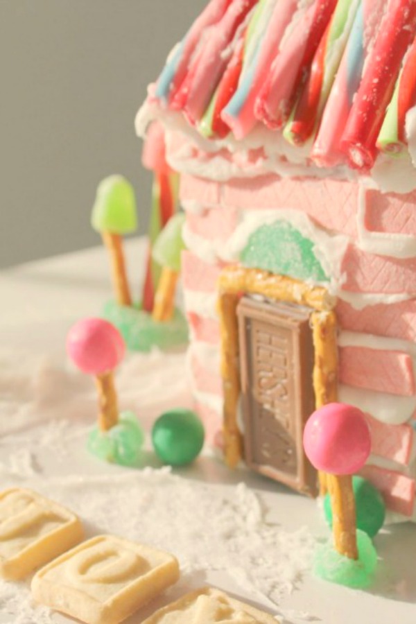 Wonky and quirky pink chewing gum candy house - Hello Lovely Studio. #gingerbreadhouse #pinkchristmas #candyhouse #diy