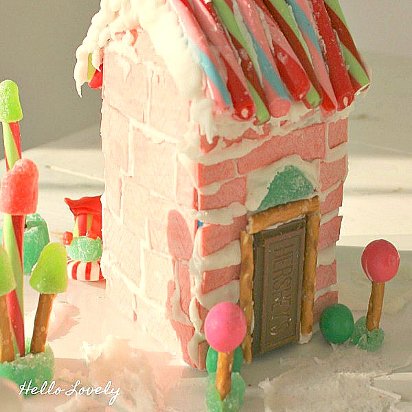 Wonky and quirky pink chewing gum gingerbread house - Hello Lovely Studio. #gingerbreadhouse #pinkchristmas #candyhouse #diy