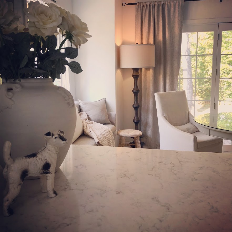 My serene kitchen with Minuet Viatera quartz counter and Belgian linen chairs - Hello Lovely Studio.