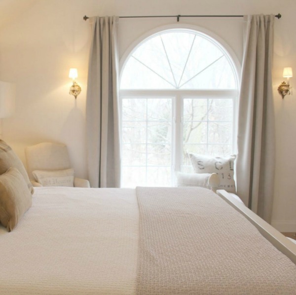 Serene and spare white bedroom - Hello Lovely Studio.
