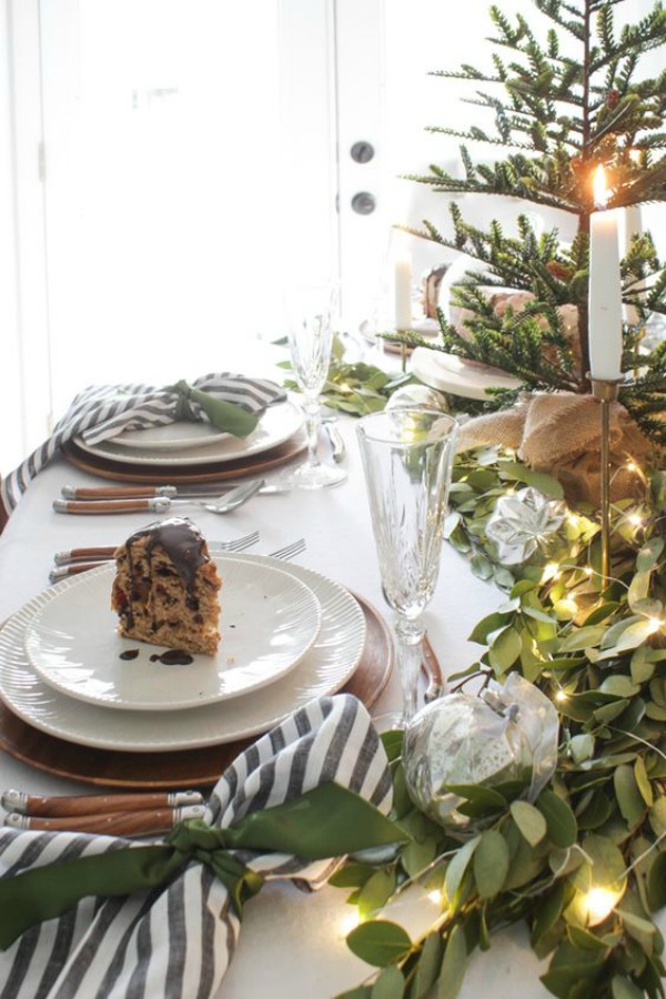 Country French farmhouse Christmas table with striped napkins - Shades of Blue Interiors. #christmastable #tablescapes #holidaydecor #frenchcountry