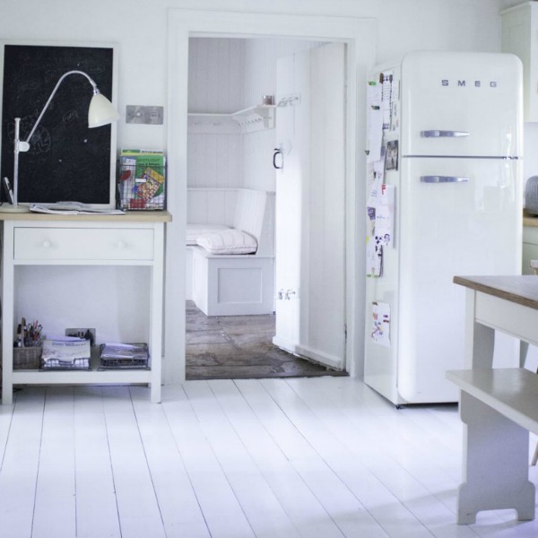 Kitchen with Smeg frig. Charming white Scandinavian style cottage interiors in a property called the Hatch (Beach Studios) near London. #scandinavianstyle #cottage #interiordesign #whitedecor