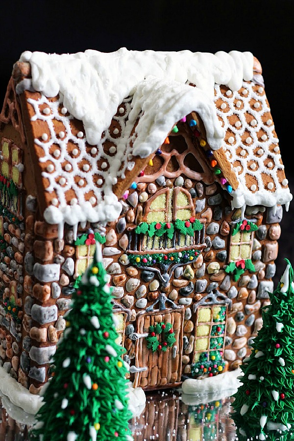 Fanciful and charming gingerbread house stone cottage - WorthPinning. #gingerbreadhouse #christmasdecor #diy