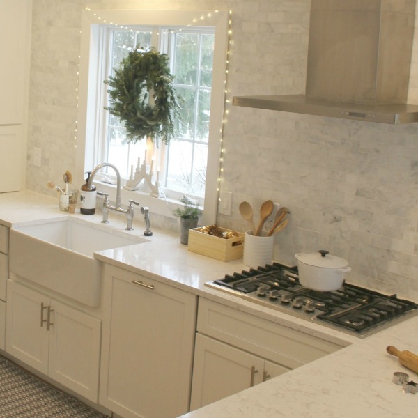 White Christmas decorated kitchen in my home - Hello Lovely Studio. #hellolovelystudio #christmaskitchen #christmasdecor