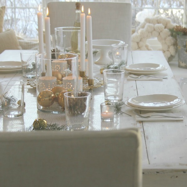 White Christmas table with gold accents and white painted farm table. #hellolovelystudio #christmastour