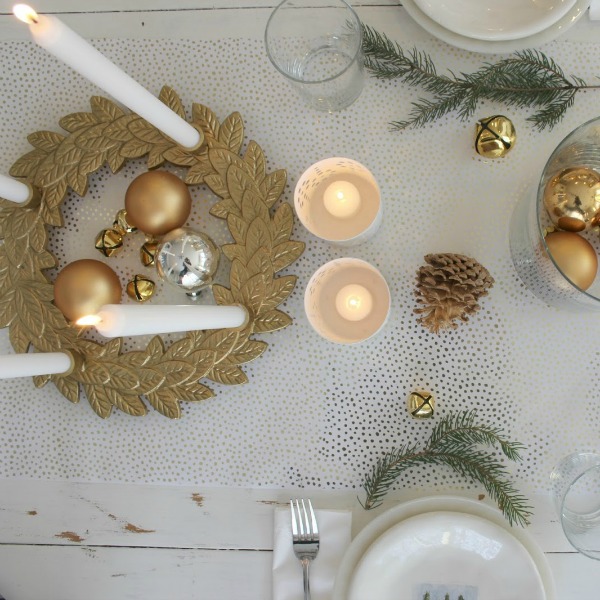 White Christmas table with gold accents and white painted farm table. #hellolovelystudio #christmastour