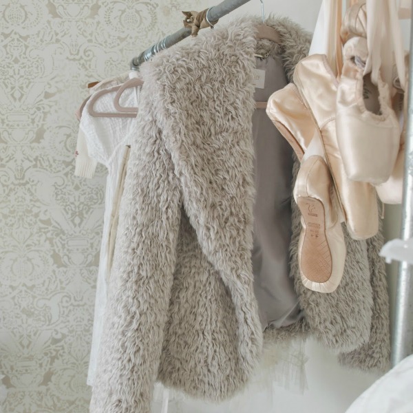 Pointe shoes and a teddy bear faux fur jacket in my dressing room - Hello Lovely Studio.