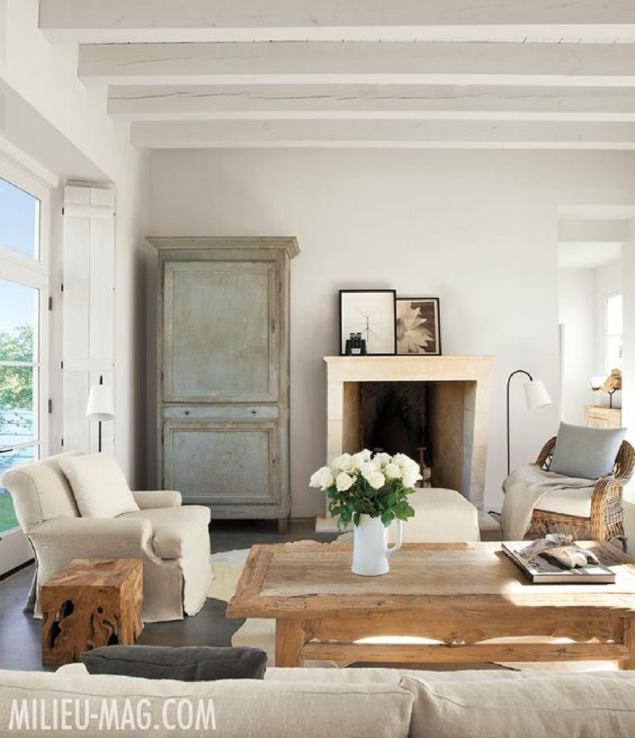 Modern farmhouse living room with French Country decor by Eleanor Cummings. Come score ideas for a Timeless and Tranquil European Country Inspired Look. #europeancountry #interiordesign #frenchcountry