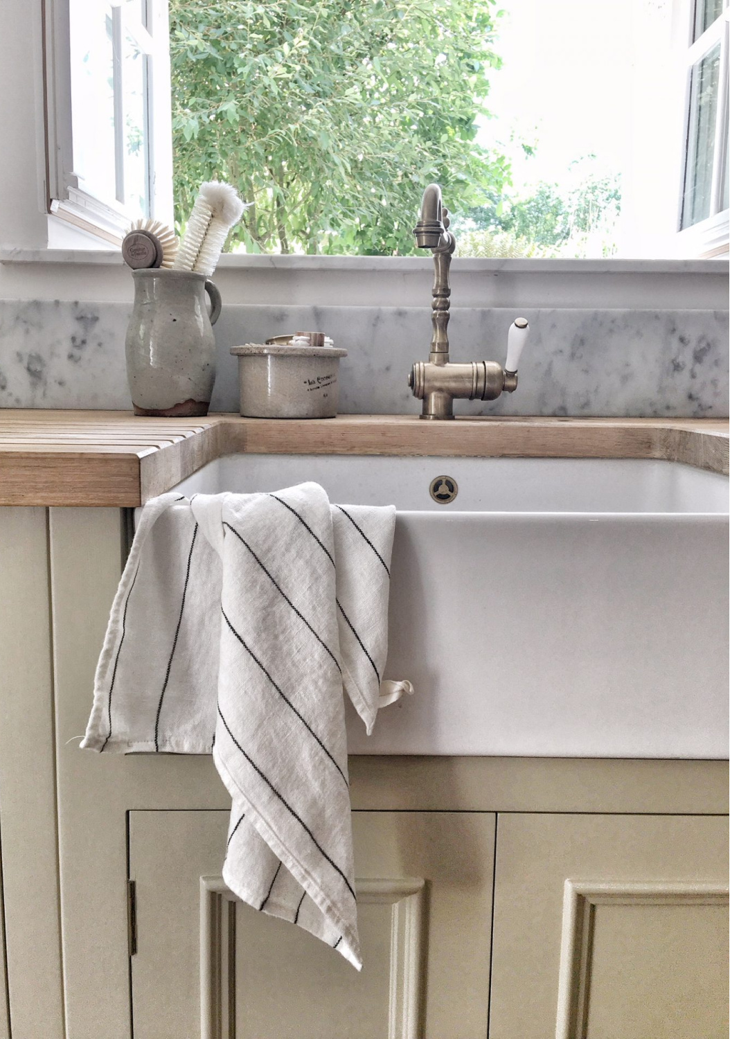 Detail of farm sink in French farmhouse kitchen. Vivi et Margot.