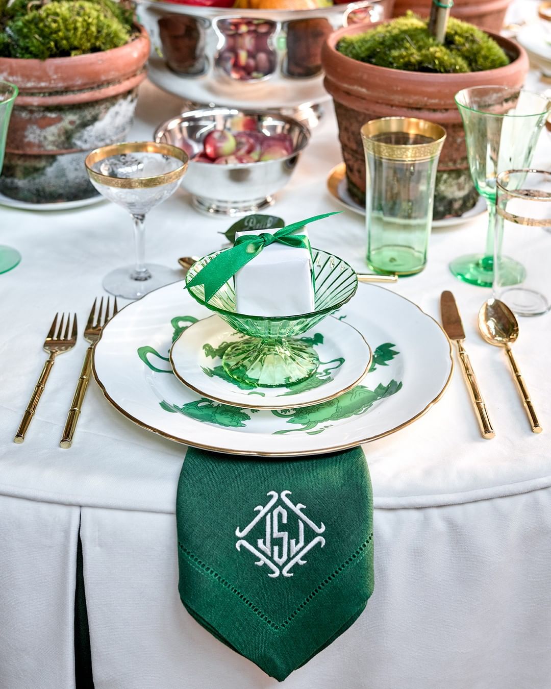 Gorgeous and elegant gree Christmas place setting and lovely tablescape by Jena Salmon for the Atlanta Home for the Holidays Showhouse 2019.