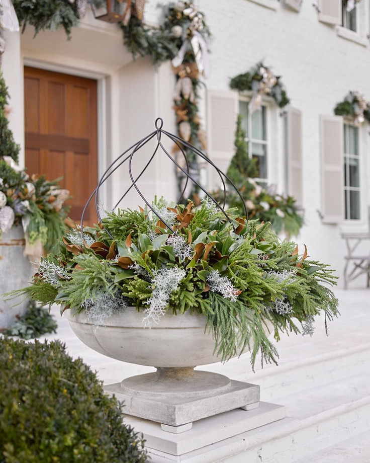 Magnificent Christmas decor on exterior of the 2016 Atlanta Home for the Holidays Showhouse with exterior decor by Lisa Mende and Boxwoods Atlanta.