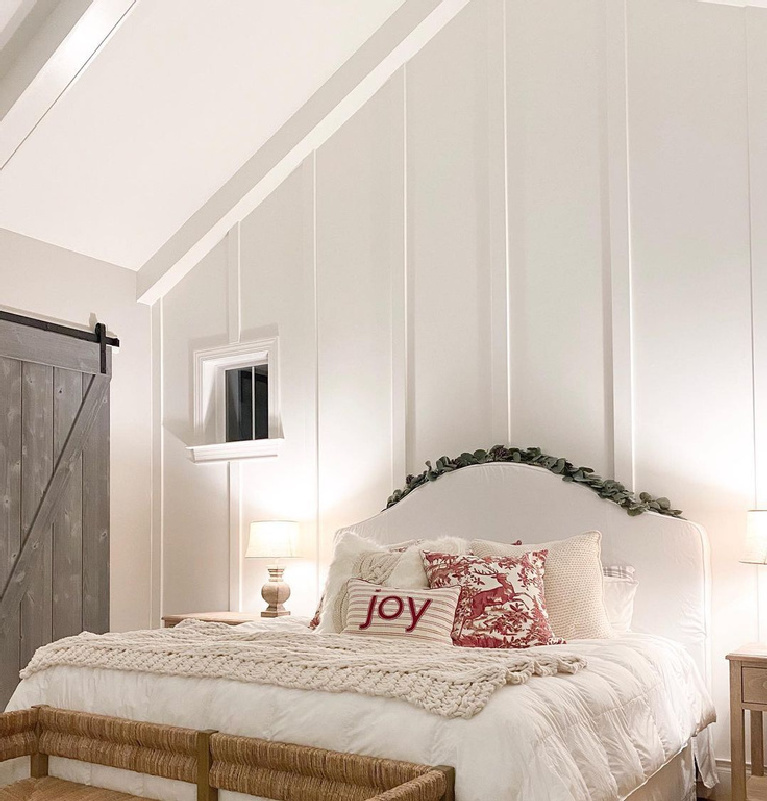 Benjamin Moore White Dove painted board and batten wall in charming bedroom by whitehomeonthehill. #whitedove #benjaminmoore #whitedovepaint #whitepaintcolors #bedrooms