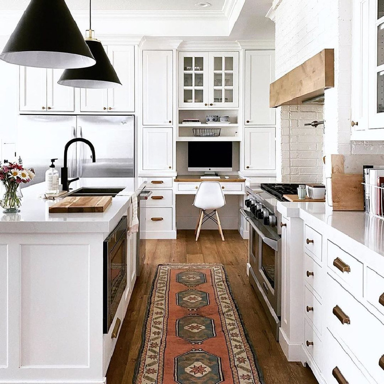 Snowbound (Sherwin-Williams) white paint in a beautiful classic kitchen with black dome pendants over island - @hawkes.landing #sherwinwilliamssnowbound #snowboundpaint