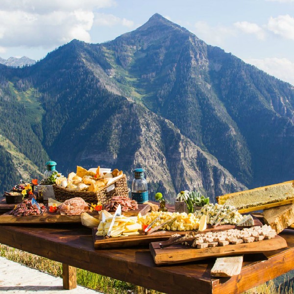 Beautiful organic tablescape in mountains - Sundance Catalog.
