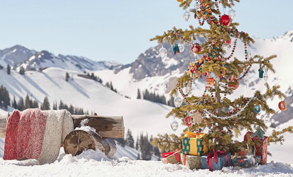 Magnificent evergreen tree decorated for Christmas in mountains - Sundance Catalog. #christmastree #mountainchristmas #naturalchristmastree
