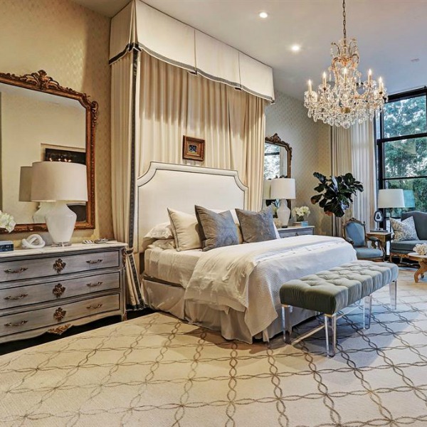 Luxurious, traditional, elegant French country bedroom in a Houston mansion with French country style by TOH. #luxuryhomedesign #bedroomdecor #frenchcountry #customhomedesign