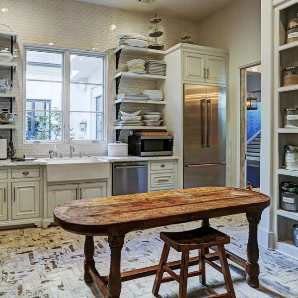 Rustic yet elegant French country butler pantry in a magnificent Houston home by TOH. #butlerpantry #frenchcountry #luxuryhome #homedesign