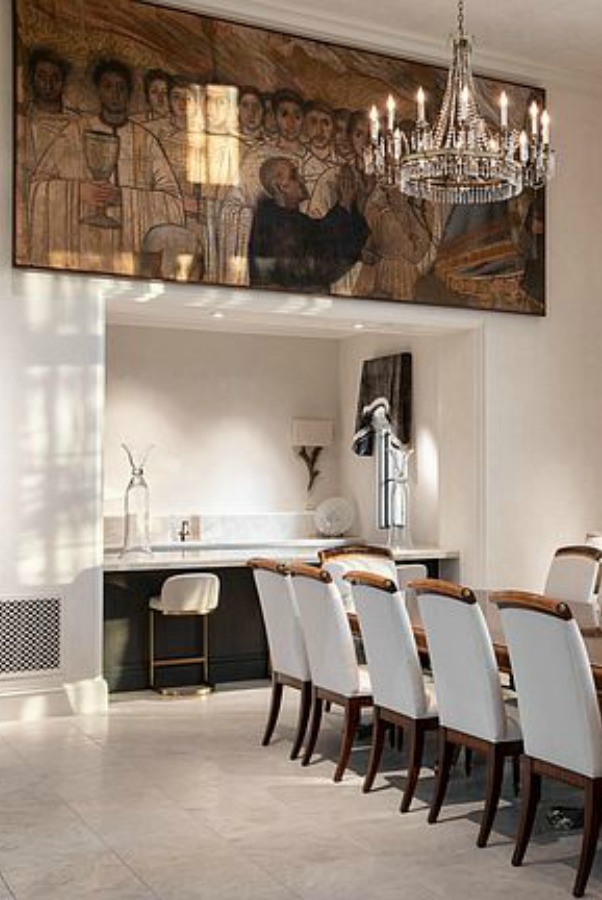 Magnificent and luxurious dining room with religious painting and opulent crystal chandelier. #luxuryhome #diningroom #scottsdalehome