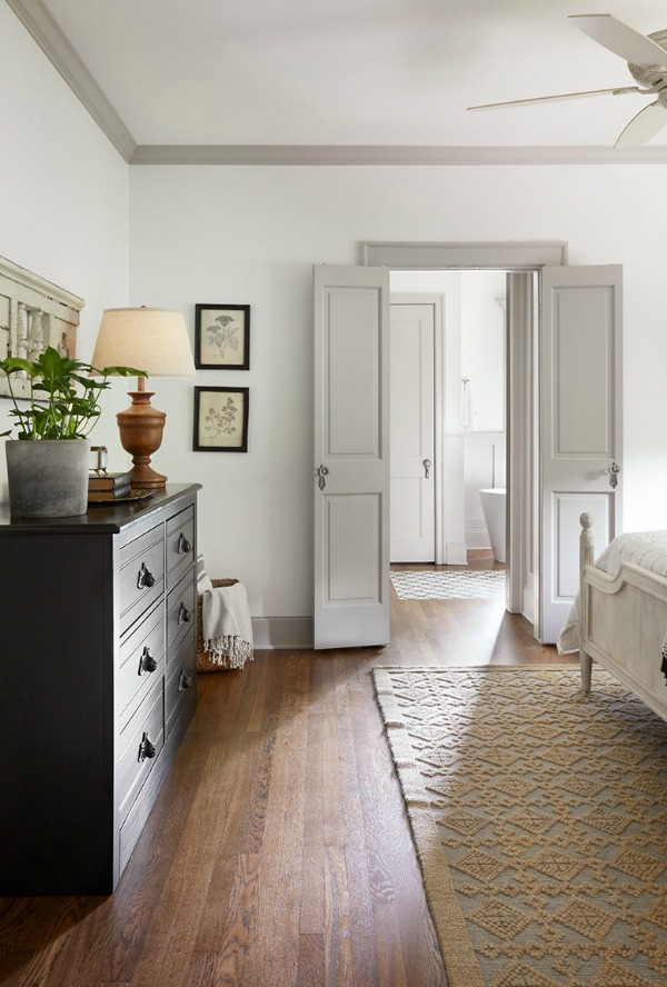 This tranquil Tudor cottage was renovated on HGTV's Fixer Upper by Chip and Joanna and is known as the Scrivano House. #fixerupper #scrivano #cottagestyle #interiordesign #greytrim #serenedecor