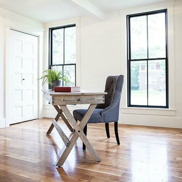 Urban farmhouse rustic design elements with black and white in a Wisconsin farmhouse. #hellolovelystudio #modernfarmhousedecor #shiplap #barndoor #farmhousedecorating #blackwindows