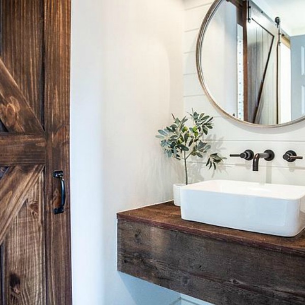 Urban farmhouse rustic design elements with black and white in a Wisconsin farmhouse. #hellolovelystudio #modernfarmhousedecor #shiplap #barndoor #farmhousedecorating #blackwindows