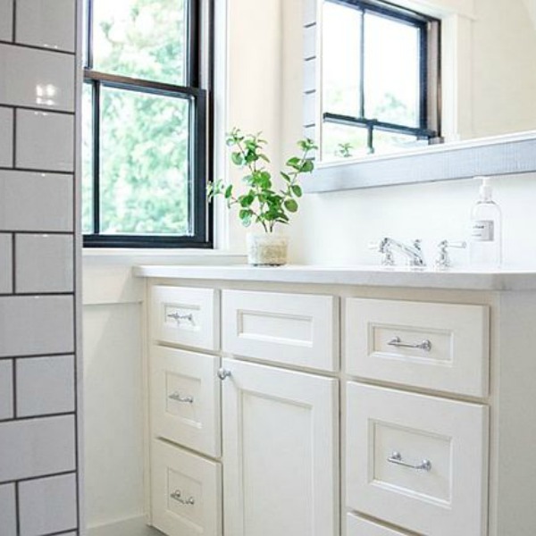 Beautiful Renovated Black & White Urban Farmhouse in Wisconsin & rustic interior design ideas to get the look. #hellolovelystudio #blackandwhitedecor #urbanfarmhouse #modernfarmhouse #interiordesign #renovatedfarmhouse