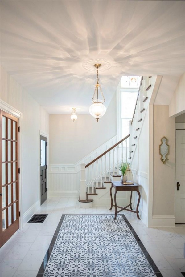 Entry and staircase in Architecturally magnificent Victorian style historic home tour (Beloit, WI). #victorianhome #interiordesign #hometour #homerenovation #historichome