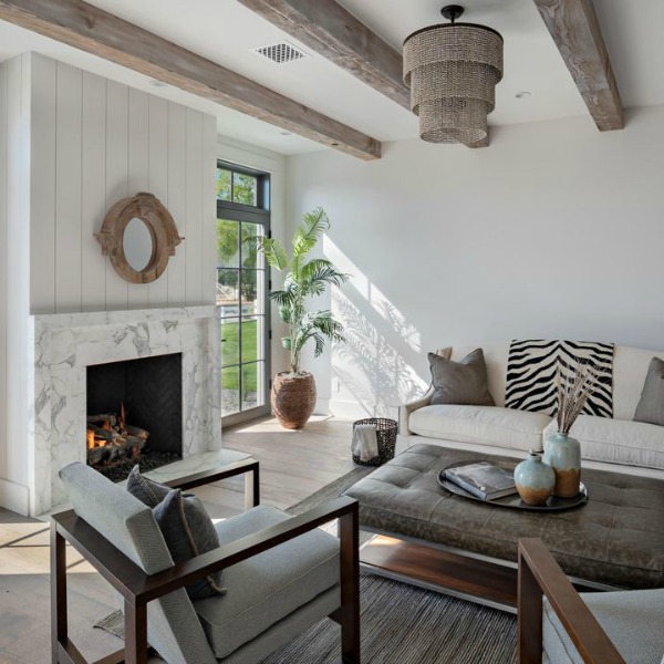 Beautiful living room with board and batten and modern farmhouse interior design by Jaimee Rose Interiors. #modernfarmhouse #interiordesign