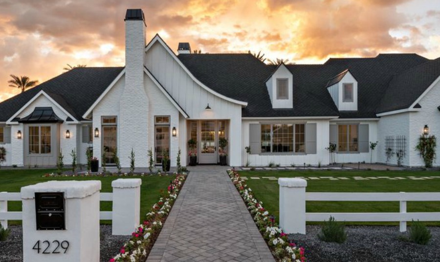 Classic white modern farmhouse exterior. #interiordesign #modernfarmhouse #houseexterior