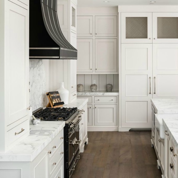 Classic white custom kitchen with black French range and vent hood. Jaimee Rose Interiors. #blackandwhite #classickitchen #kitchendesign