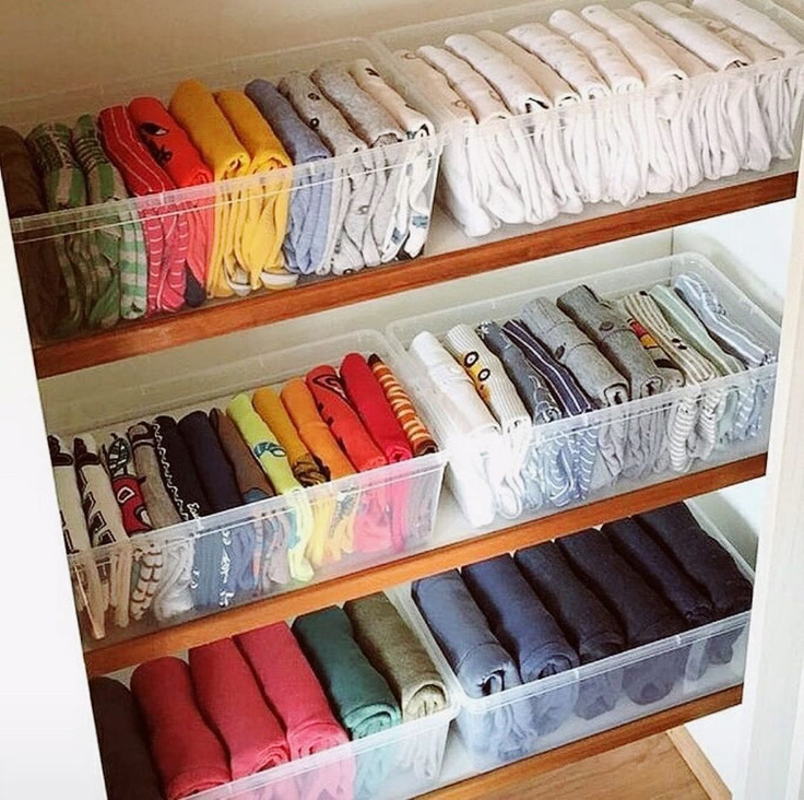 Perfectly organized tshirts in clear containers on shelves in an organized closet - @cos_mycloset. #closetgoals #organizedcloset #organizationideas