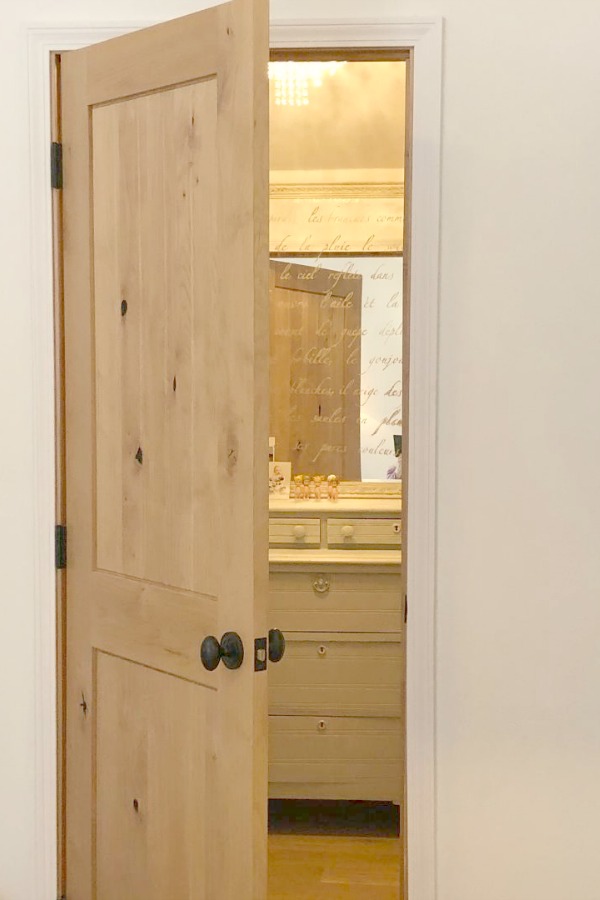 Knotty alder wood interior door to my closet - Hello Lovely Studio. #closet #alderdoor #hellolovelystudio #interiordesign