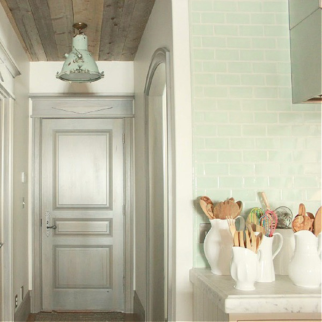 Detail of stained grey door in rustically elegant European country cottage - Desiree of Beljar Home and DecordeProvence. #europeancountry #cottagestyleinteriors