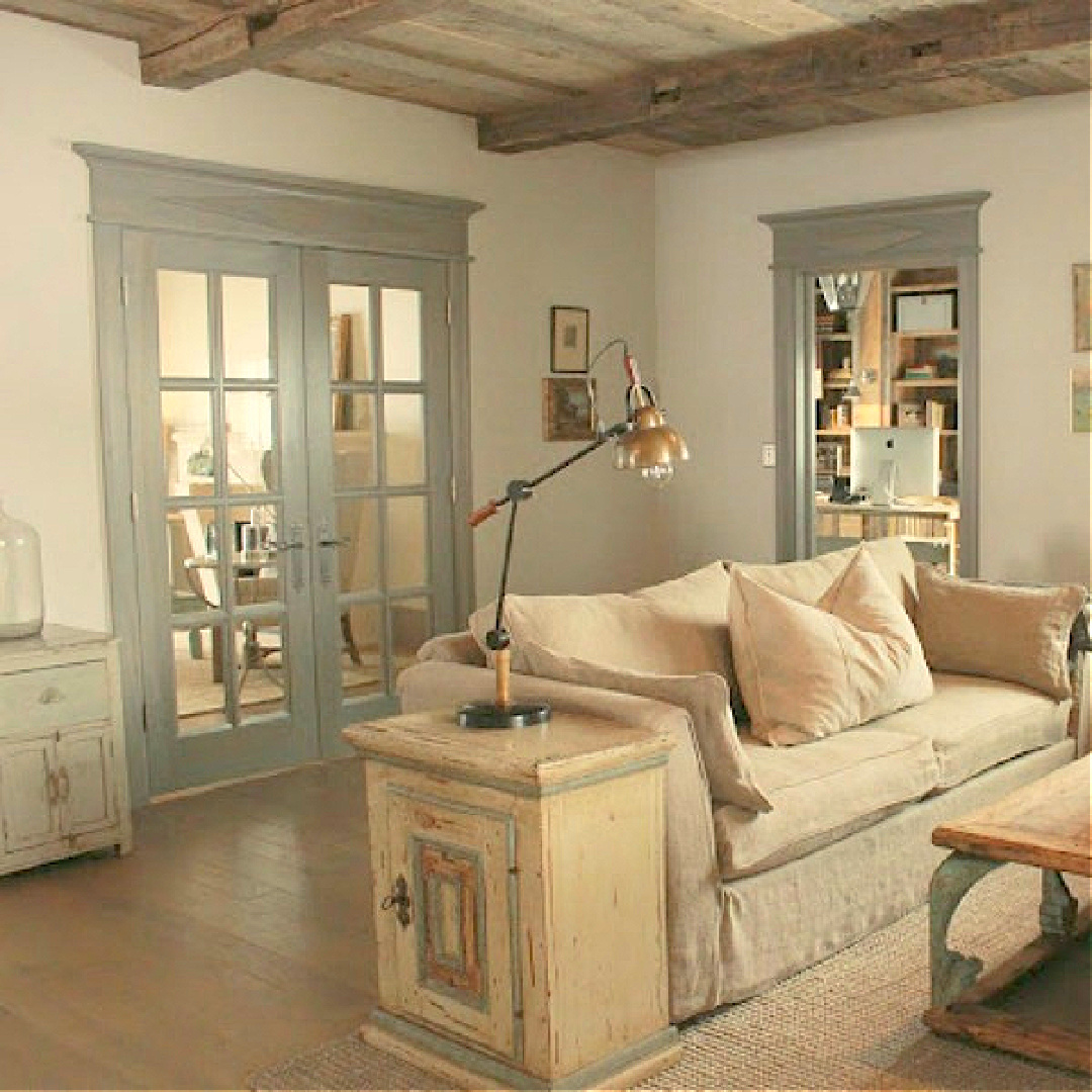 Family den in rustically elegant European country cottage - Desiree of Beljar Home and DecordeProvence. #europeancountry #cottagestyleinteriors