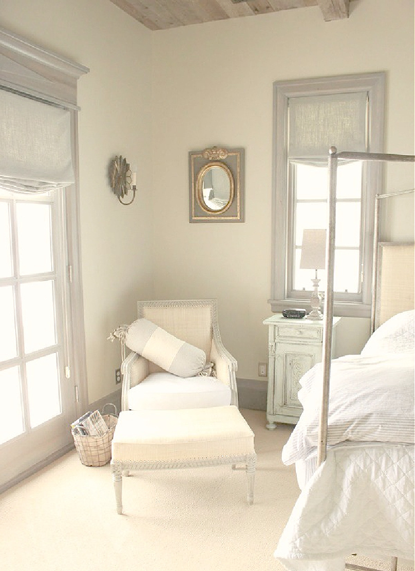 Arm chair and ottoman in bedroom in rustically elegant European country cottage - Desiree of Beljar Home and DecordeProvence. #europeancountry #cottagestyleinteriors