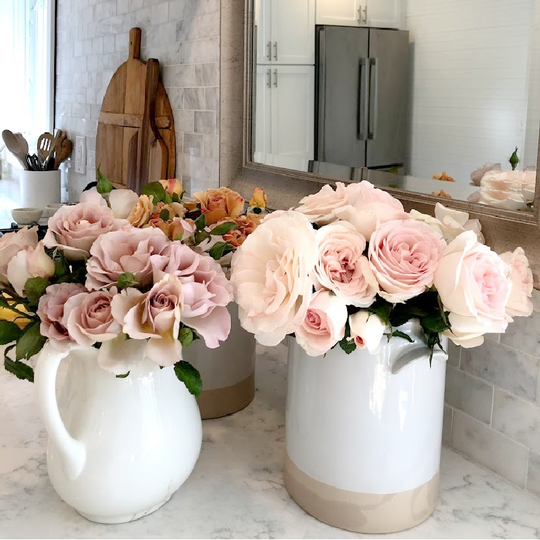 Koko Loco, Stephen Rullo, and Francis Meilland garden roses in my white kitchen - Hello Lovely Studio.