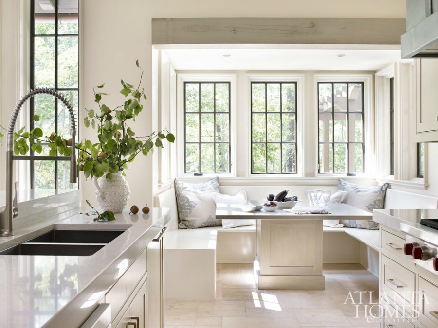 Timeless kitchen architecture and design (look at that built in booth!) by Atlanta-based Jeffrey Dungan who mixes rustic with elegant in luxury home design. #architecture #luxuryhome #jeffreydungan #timelessdesign #sophisticateddesign