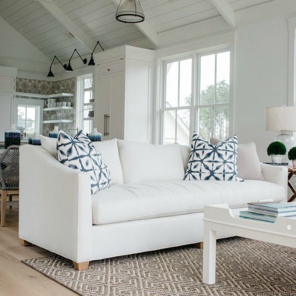 White coastal cottage living room with interior design by Lisa Furey. #coastalcottage #interiordesign #livingroom
