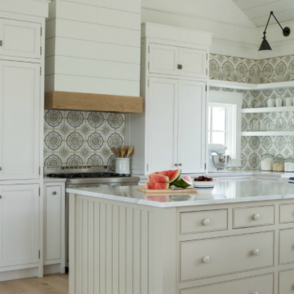 Beautiful white coastal cottage kitchen with design by Lisa Furey and Benjamin Moore WHITE paint color. #benjaminmoorewhite #kitchendesign #coastalcottage #interiordesign