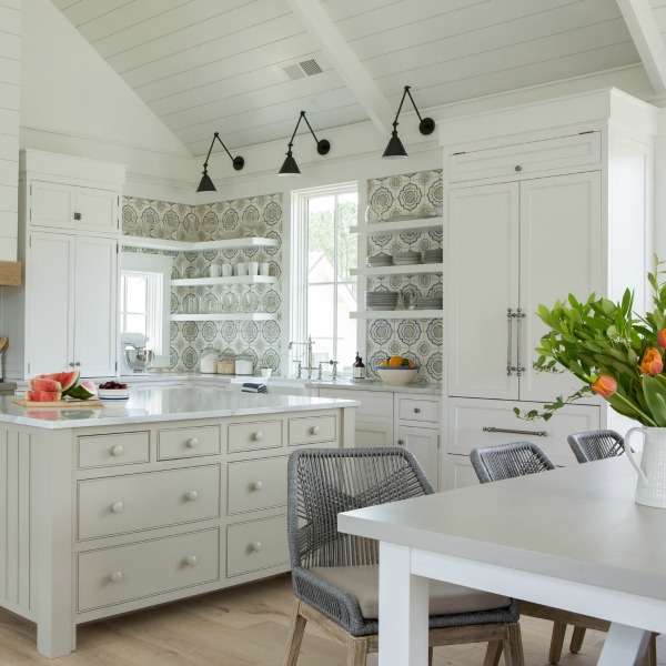 Beautiful white coastal cottage kitchen with design by Lisa Furey and Benjamin Moore WHITE paint color. #benjaminmoorewhite #kitchendesign #coastalcottage #interiordesign