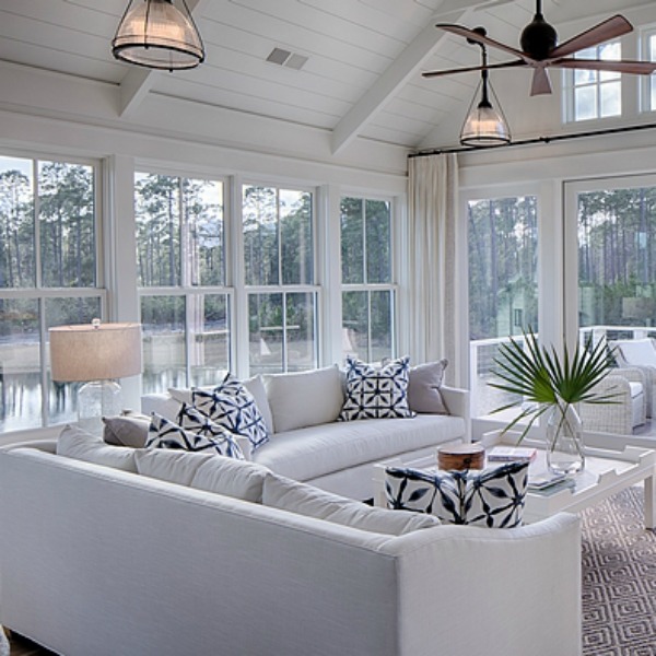 Beautiful white coastal cottage great room with indigo blue accents. #livingroom #interiordesign #cottagestyle #coastalcottage