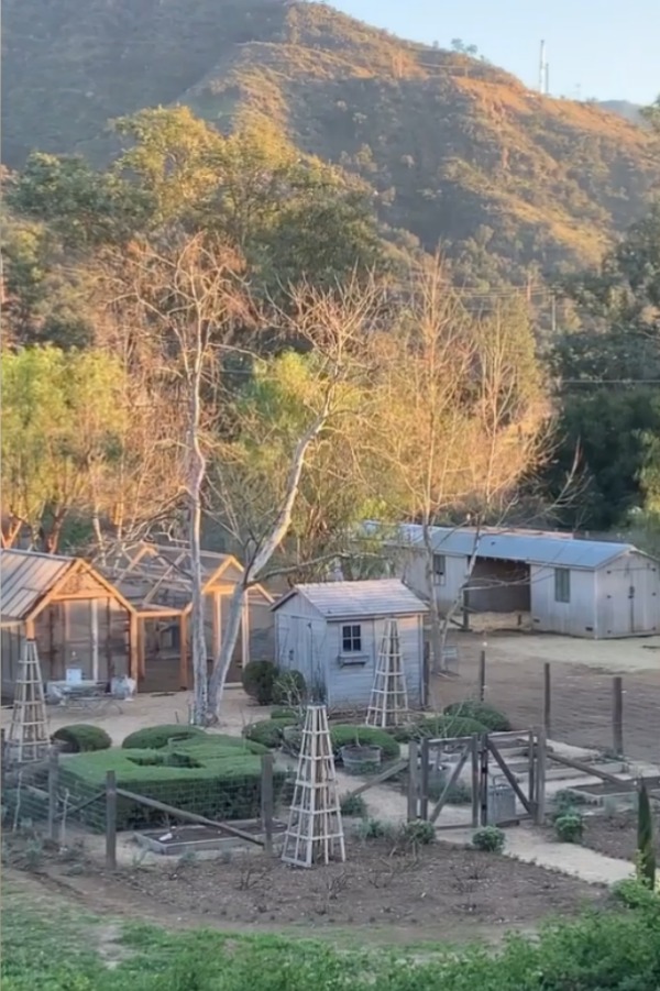 Beautiful view of outbuildings at Patina Farm in Ojai, California, where the Giannettis have created a little Eden for a few lucky animals to shelter. #patinafarm #giannettihome #farmhousedesign #outbuildings