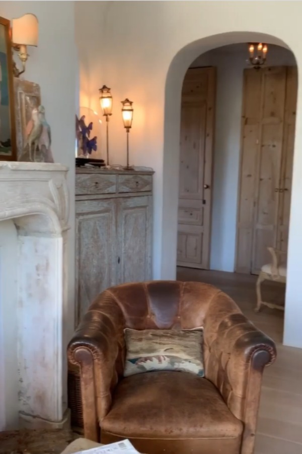 Romantic bedroom at Patina Farm (a European country farmhouse by Giannetti Home) has antiques from Sweden, sumptuous linens, a French stone fireplace, and rustic elegant charm. #interiordesign #bedroomdesign #europeancountry #frenchfarmhouse #patinafarm #brookegiannetti