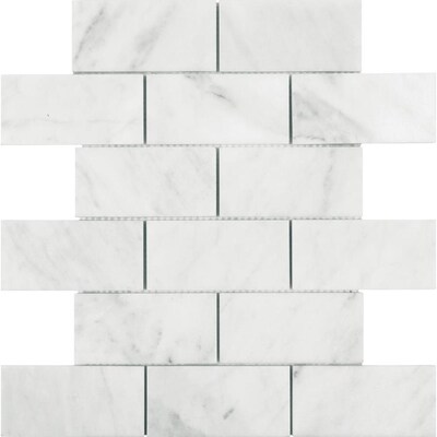 Allen + Roth polished venatino marble mosaic subway tile used in our kitchen. Hello Lovely Studio.