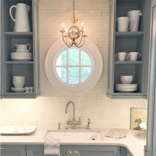 Atlanta Southeastern Designer Showhouse 2017 kitchen with Farrow & Ball Light Blue cabinets and brass hardware. Elegant Blue Kitchen Design: What Makes it Timeless?