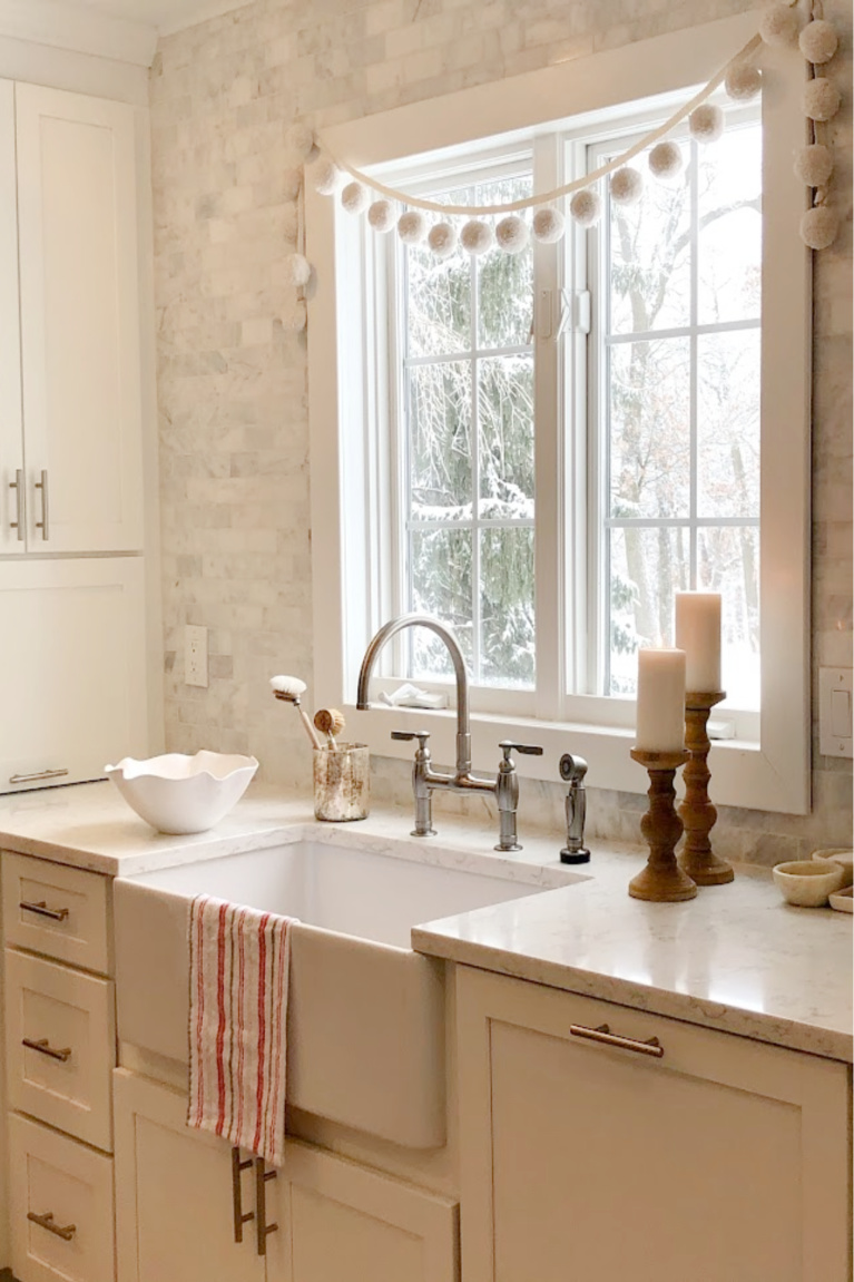 Viatera Minuet quartz countertop in my classic white kitchen (with Modern French influence) paired with polished marble subway tile backsplash - Hello Lovely Studio. #whitequartz #quartzcountertops #minuet