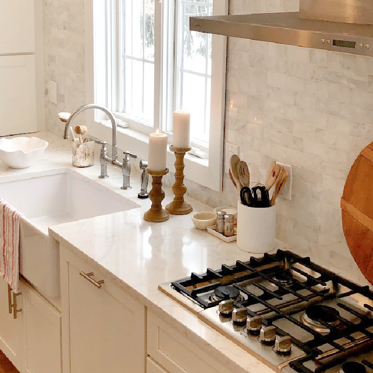 Viatera Minuet quartz countertop in my classic white kitchen (with Modern French influence) paired with polished marble subway tile backsplash - Hello Lovely Studio. #whitequartz #quartzcountertops #minuet