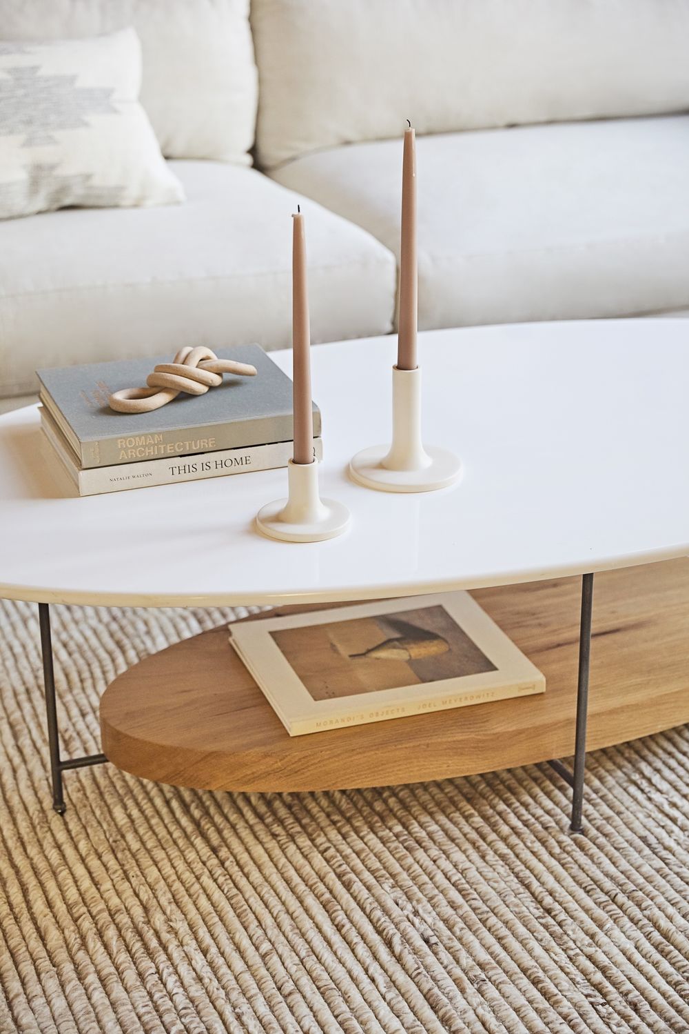 Cozy white living room with rustic accents and an airy coastal organic Cali vibe - Lulu & Georgia. #whitedecor #livingroom #casualstyle #interiordesign #neutraldecor